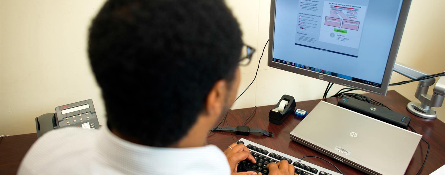 NCDMV Employee at Computer